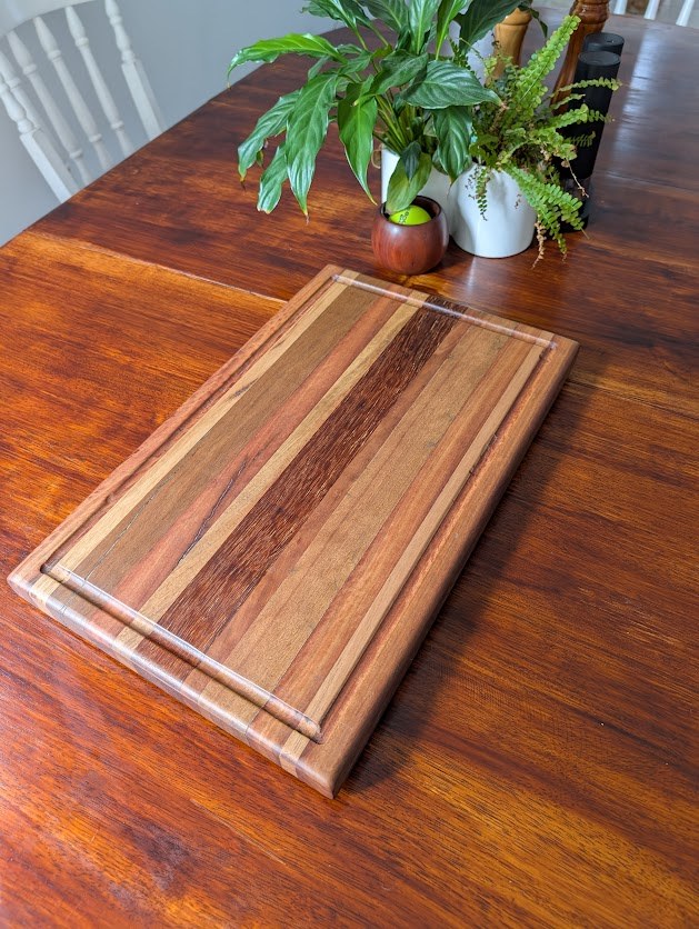 Angled view of Skipsey's Woodworking board with warm brown tones