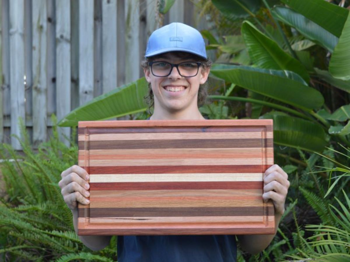 Noah holding the finished board